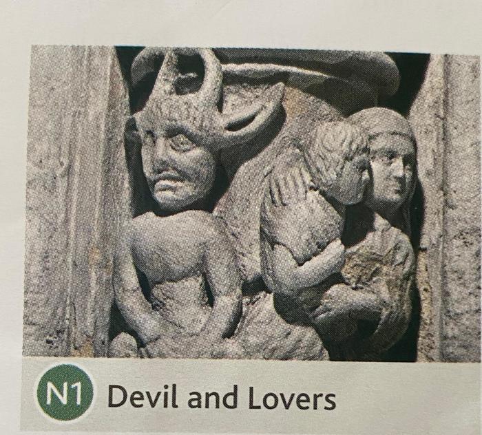 悪魔と愛人たちと題された彫刻