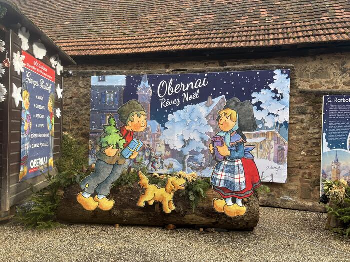 オベルネのクリスマスの女の子と男の子のイラスト看板